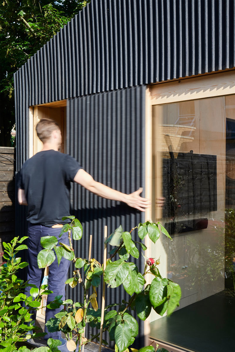A backyard studio with built-in storage shed.