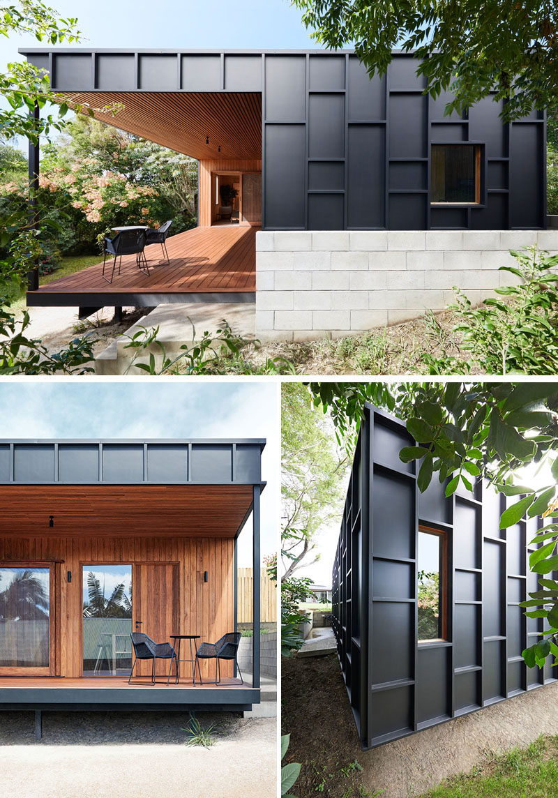 House Siding Ideas - The exterior of this modern house is covered in black fibre cement sheets with matching black battens, that create dimension and define the window locations. #ModernHouse #BlackSiding #Architecture #HouseSidingIdeas