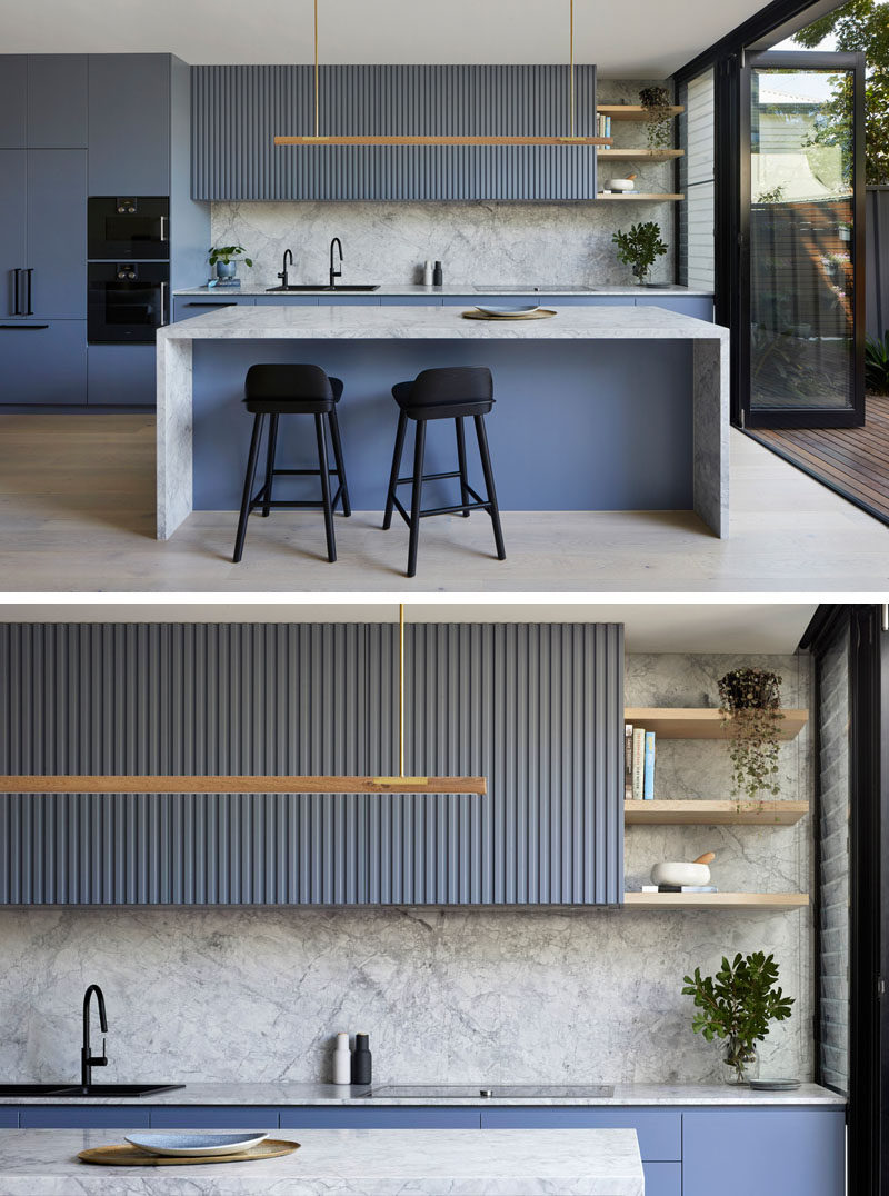 Kitchen Ideas - Blue-grey cabinets have been combined with marble, to create  a modern and eye-catching kitchen. #KitchenIdeas #BlueKitchen #GreyKitchen #KitchenDesign