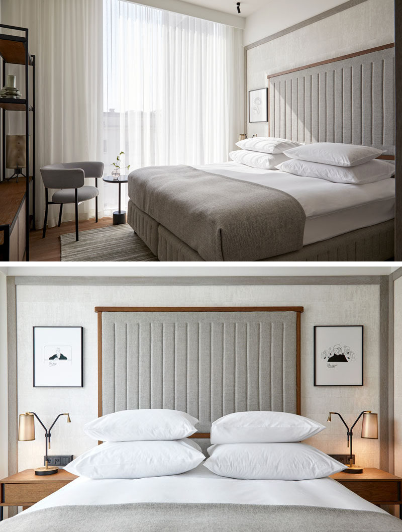 Bedroom Ideas - In this hotel room, a contemporary palette of wood and light grey has been used, while an wood-framed upholstered headboard is flanked on either side by small pieces of artwork. #BedroomIdeas #ModernBedroom #CalmBedroom