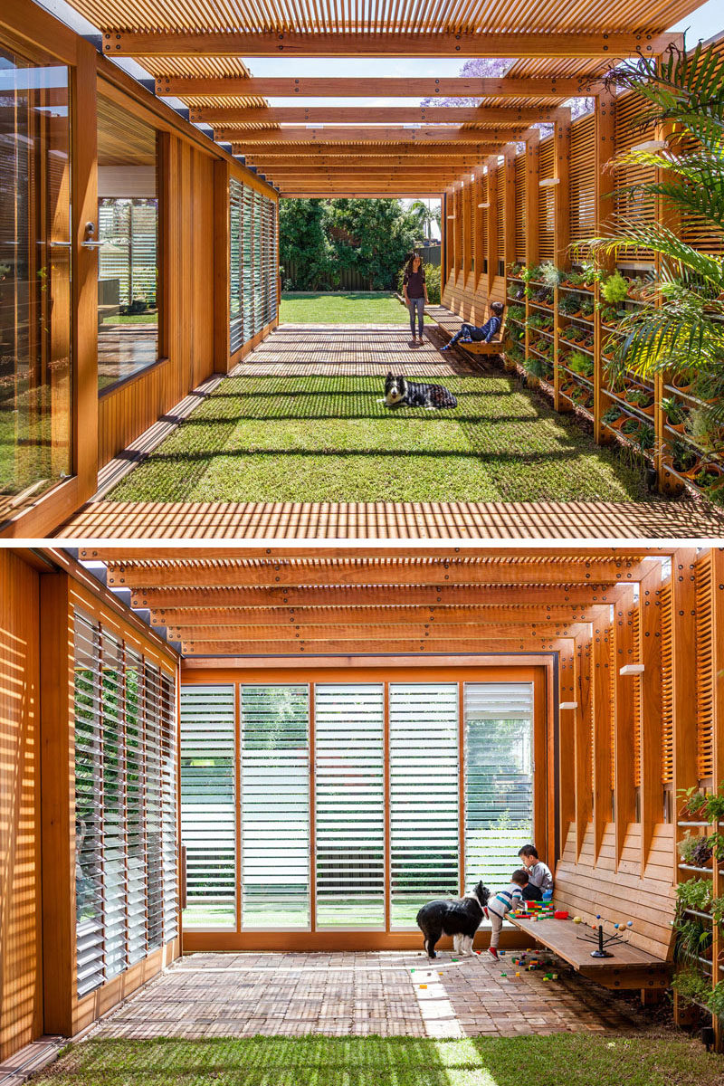 Landscaping Ideas - This modern outdoor room features a built-in wood seat, shade from wood slats, a small grassy area, and a garden wall. #OutdoorRoom #GardenWall #HerbGarden #OutdoorSeating #WoodSlats #Landscaping