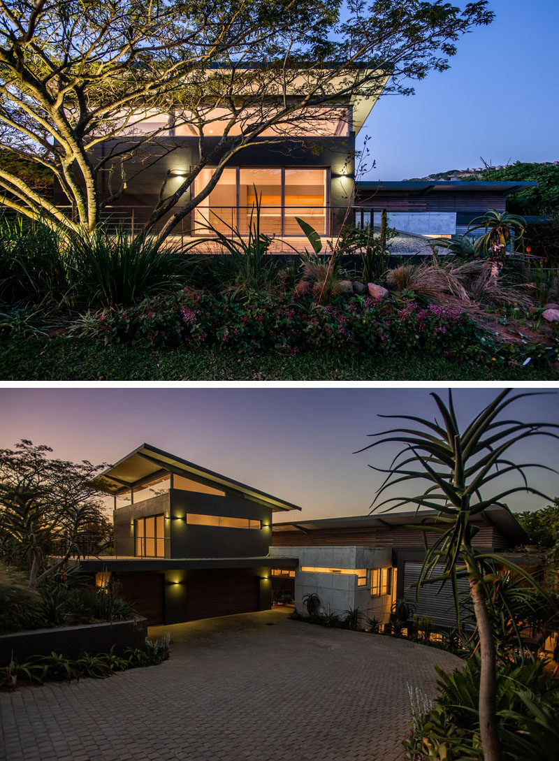 Large established trees and bush surround this modern house, providing privacy and shade. #ModernHouse #ModernArchitecture