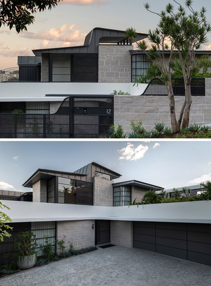 Located on the low side of the street, the house features a lightening shaped zinc roof, while the garage is concealed below a green roof. #Architecture #ZincRoof #ModernHouse