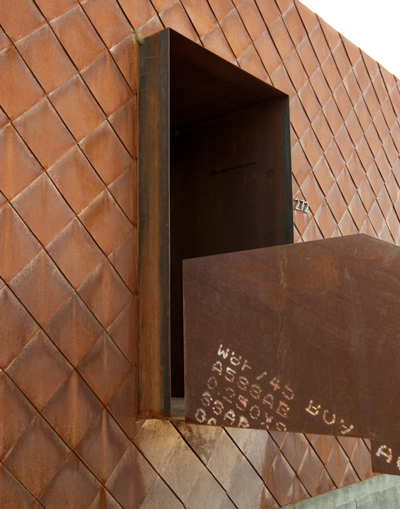 Siding Ideas - The warm colors of weathering steel cladding have been combined with board-formed wood textured concrete and glass for a contextual, low-maintenance and modern material palette for this house in Utah. #WeatheringSteelSiding #SidingIdeas #CortenSteel #Architecture