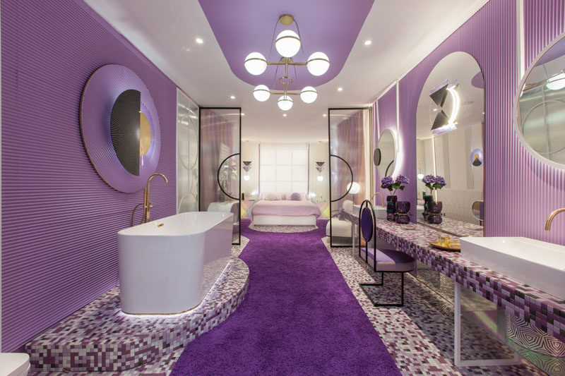 When designing this modern hotel suite, the color violet was chosen as it represents the mixture of masculine with feminine (red and blue), and sensuality with spirituality. #Violet #PurpleInterior #PurpleBedroom #PurpleBathroom