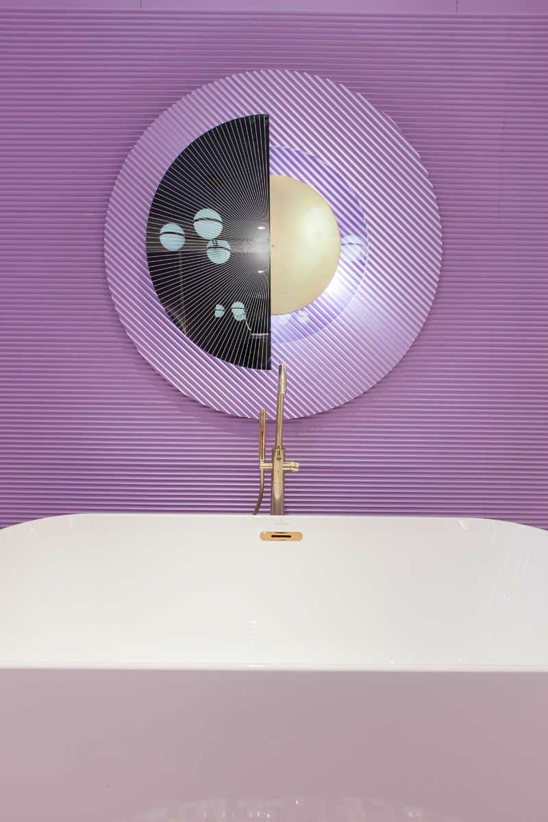 Bathroom Ideas - This modern purple bathroom has been entirely designed with pieces from the Finion series by Villeroy & Boch, while the brass taps are from Oioli. #PurpleBathroom #BathroomIdeas