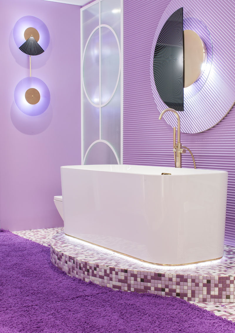 Bathroom Ideas - This modern purple bathroom has been entirely designed with pieces from the Finion series by Villeroy & Boch, while the brass taps are from Oioli. #PurpleBathroom #BathroomIdeas