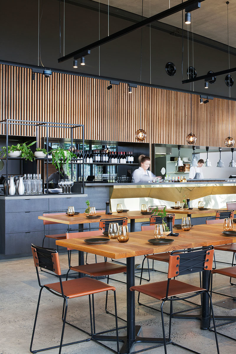 Bar Ideas - These modern winery tasting bars feature a repetitive tectonic form of shifting brass panels to reflect the undulating landscape. #BarIdeas #HospitalityDesign #RestaurantDesign