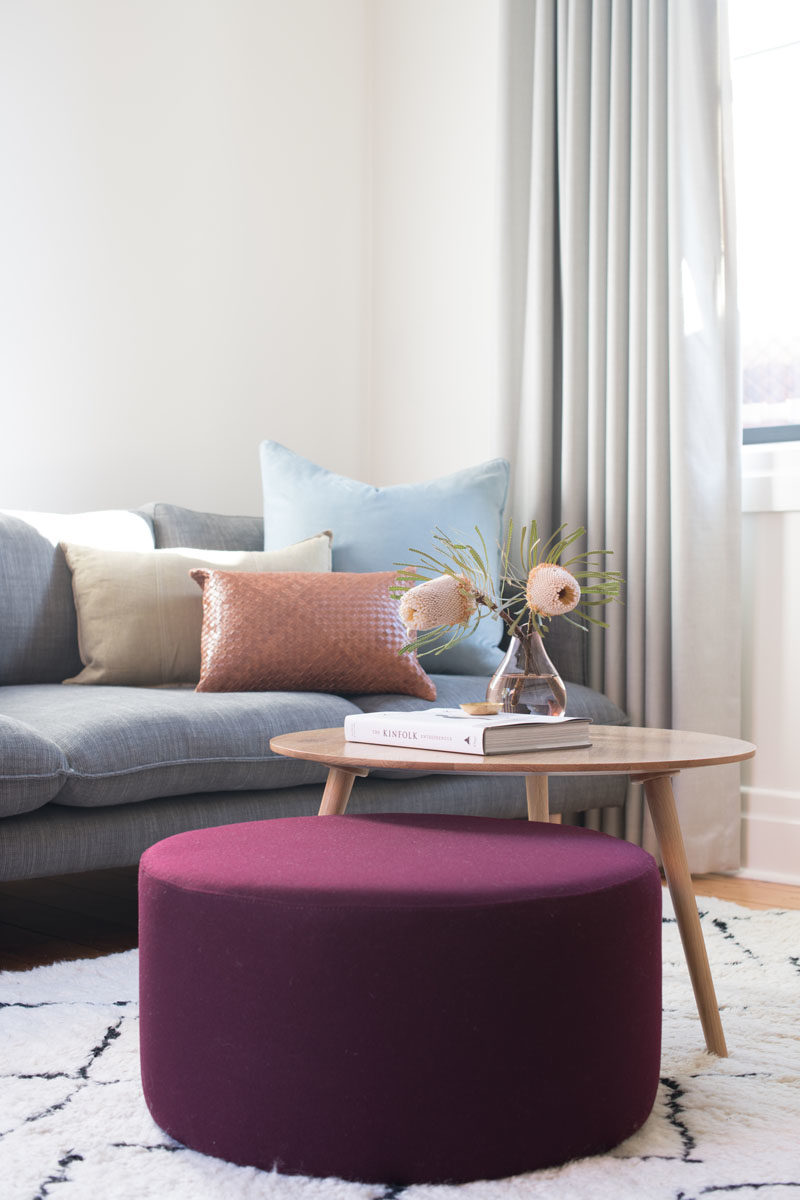 Living Room Ideas - Soft colors and a bold purple accent create a relaxing living room that's also fun. #LivingRoomIdeas #LivingRoomFurniture #LivingRoom