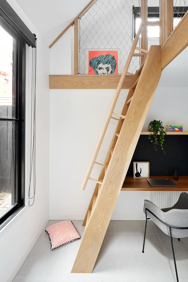 A new wood addition houses a space for studying, as well as a loft, that's been designed as a kids sleepover area. #HouseAddition #StudyArea #KidsPlayLoft