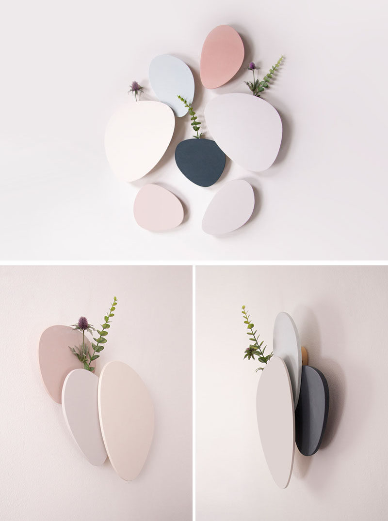 Decor Ideas - The Teumsae wall-mounted vases were inspired by plants growing through the tiny gaps between pavements and stones. #HomeDecorIdeas #DecorIdeas #WallMountedVase #Vases #WallDecorIdeas