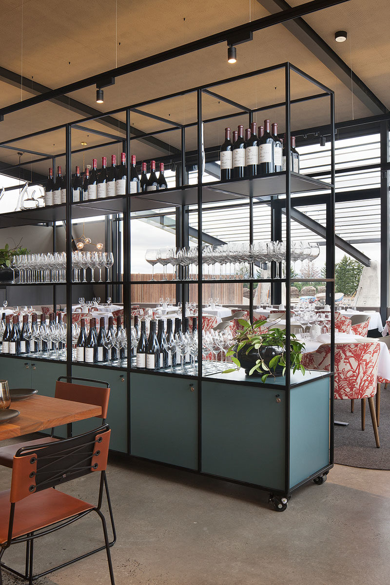 Shelving Ideas - In this modern restaurant, modular shelving on castor wheels enables the space to cater to larger functions. The shelving units also provide display space for merchandise and working zones for waiters. #ShelvingIdeas #RestaurantIdeas #ModularShelving #MoveableShelves #Shelving