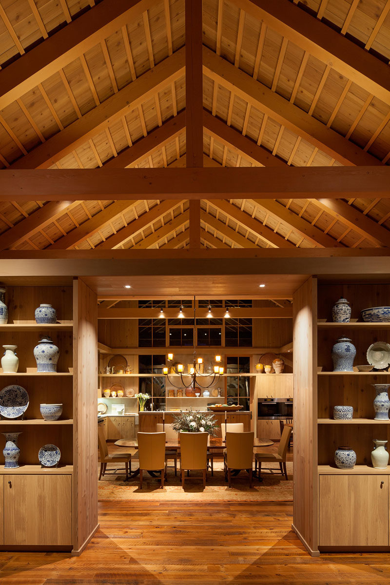 Shelving Ideas - This living room features custom casework designed to display a rich collection of Asian porcelain. #Shelving #Cabinetry #ExposedCeiling