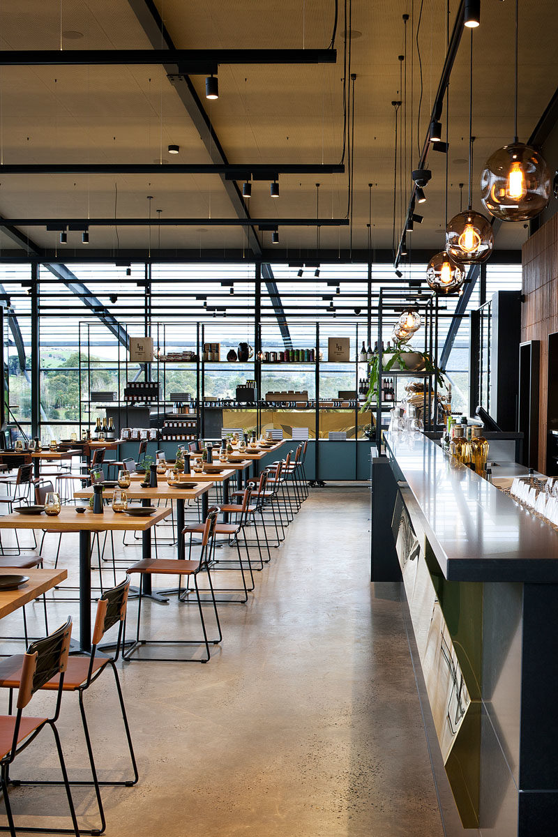 Bar Ideas - These modern winery tasting bars feature a repetitive tectonic form of shifting brass panels to reflect the undulating landscape. #BarIdeas #HospitalityDesign #RestaurantDesign