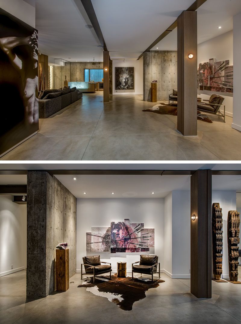 In this modern basement, polished concrete floors and 10 feet ceilings are featured throughout. #ConcreteFloors #PolishedConcrete #Basement