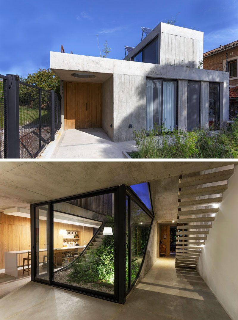 This modern concrete house has been designed to have a garden which connects all of the architectural floors, which is immediately visible from the front door. #ConcreteHouse #ModernHouse #Garden #Landscaping