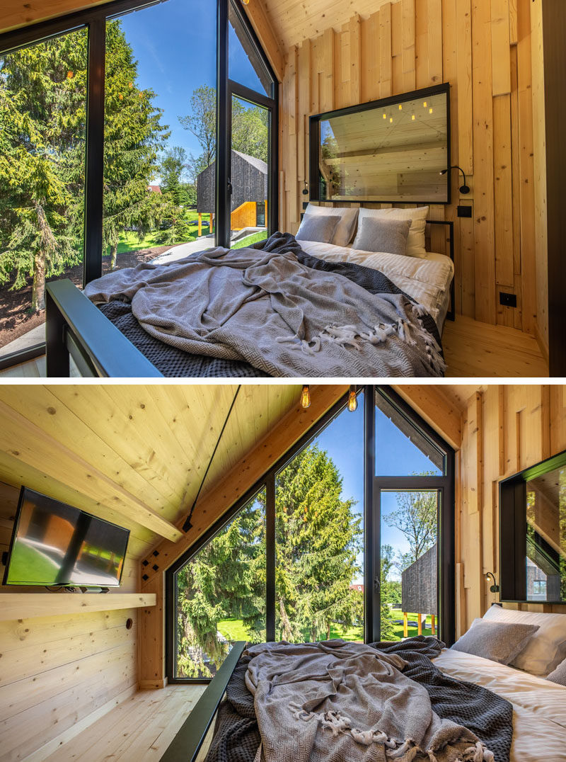 Bedroom Ideas - In this modern bedroom, natural wood elements are highlighted, while large windows follow the roof line. #BedroomIdeas #BedroomDesign #Windows