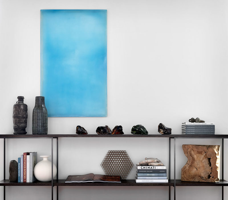 Decor Ideas - This modern open shelving credenza was designed to align with the adjacent window mullions. #Shelving #DecorIdeas