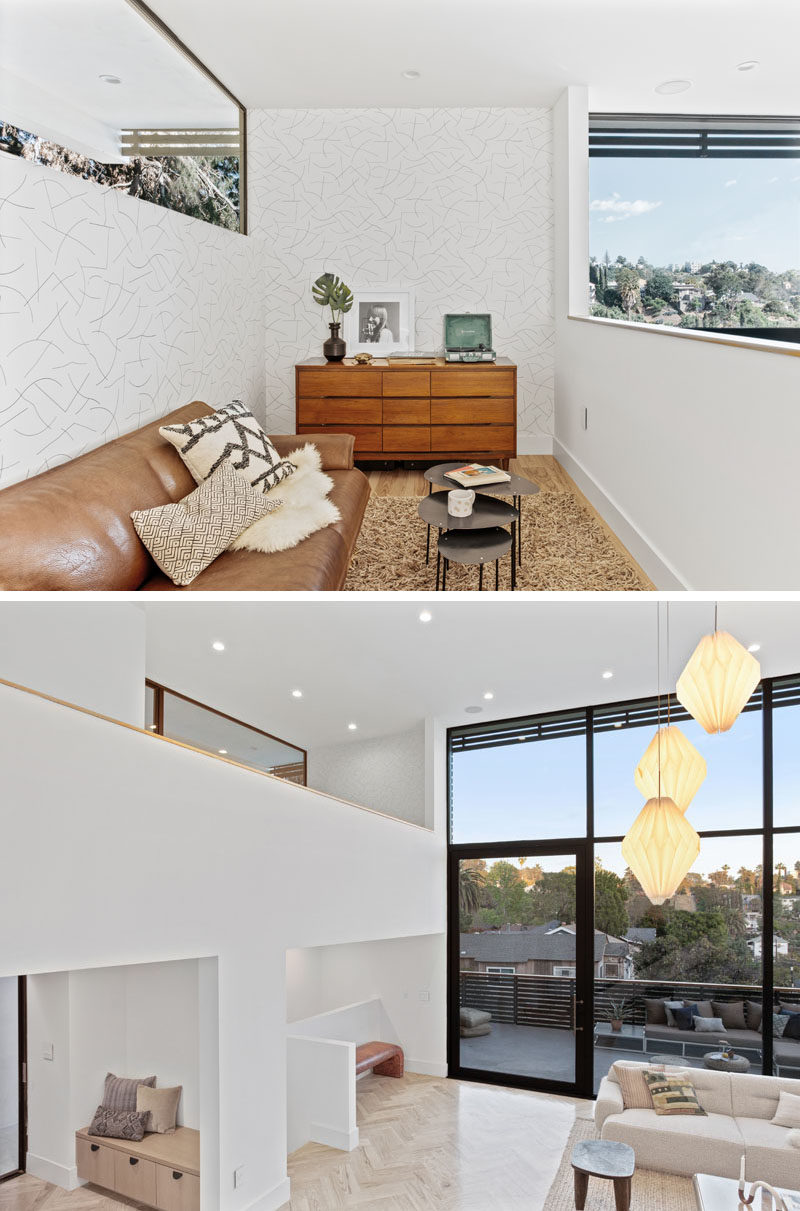 This modern house has a small loft area that overlooks the living room below. #Loft #InteriorDesign