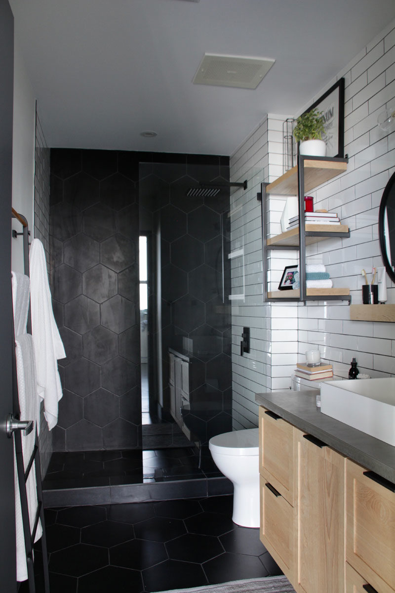 Bathroom Ideas - Matte black large format hexagonal tiles were used in the new walk-in shower and on the floor. #HexagonalTiles #ModernBathroom #BathroomIdeas #BlackTiles