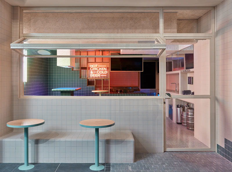 Restaurant Ideas - Tiles and tiered seating have been used throughout this modern restaurant to create a unified appearance that's inspired by retro 60's style and Korean bath houses. #Tile #RestaurantDesign #RestauarantIdeas