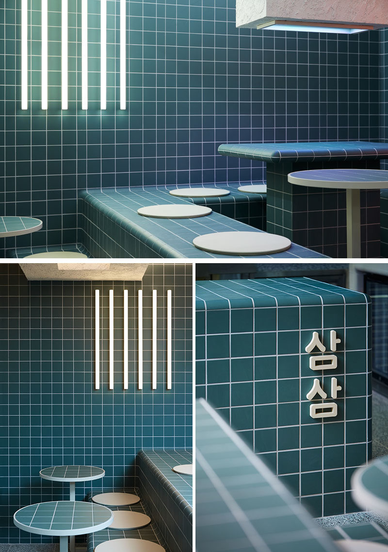 Restaurant Ideas - Deep blue-green tiles have been used throughout this modern restaurant to create a unified appearance that's inspired by retro 60's style and Korean bath houses. #Tile #RestaurantDesign #RestauarantIdeas