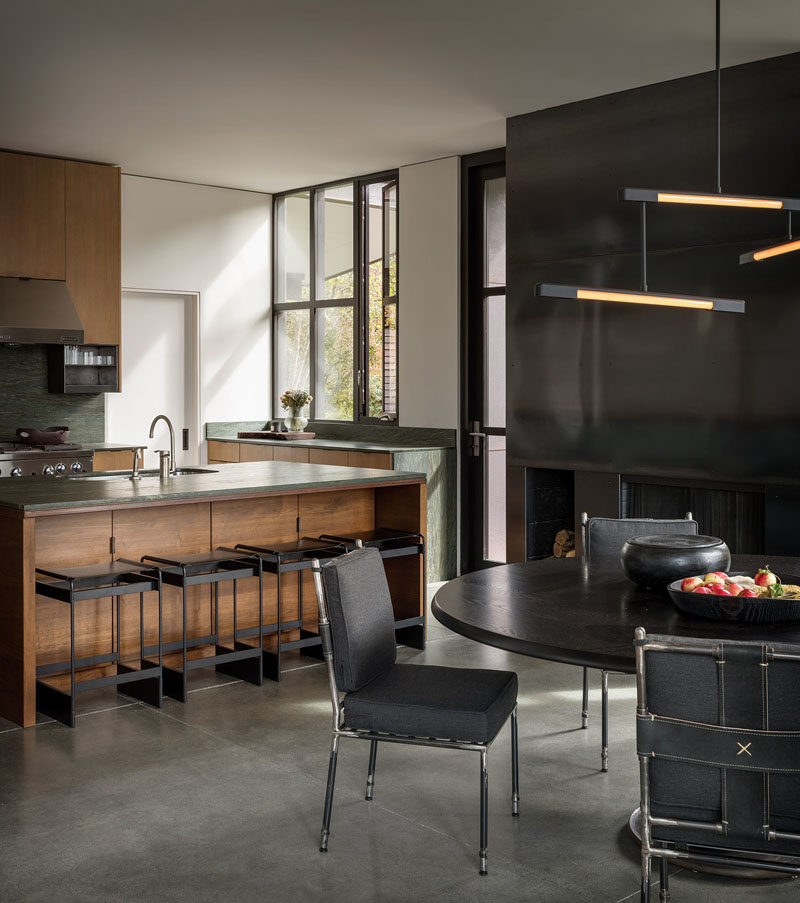 Kitchen Ideas - This modern kitchen features green soapstone countertops and oak veneer cabinets. #KitchenIdeas #ModernKitchen #KitchenDesign