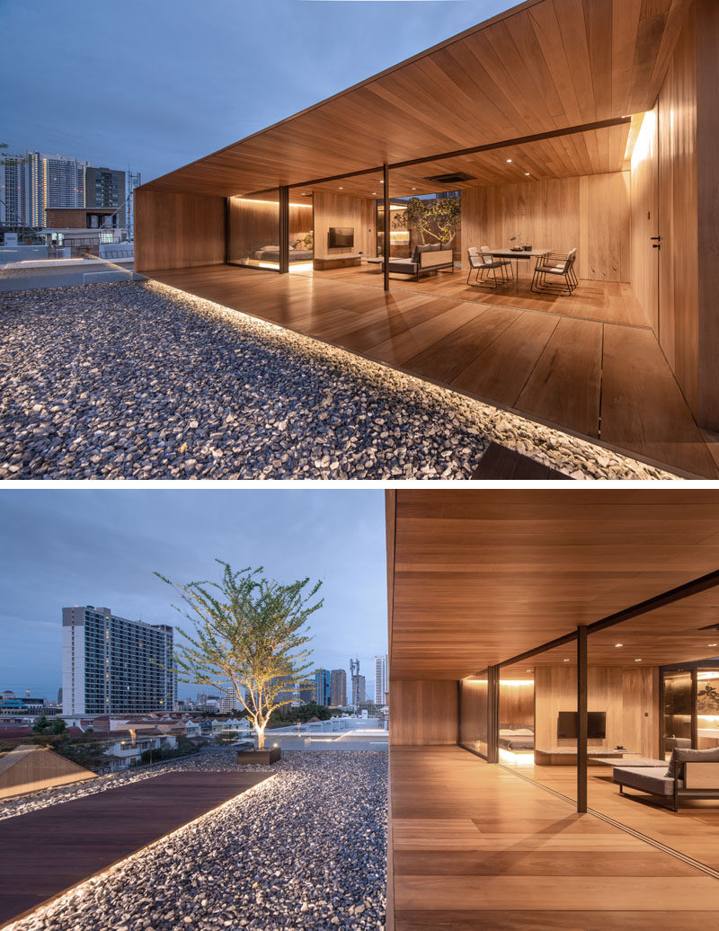 WARchitect has designed a modern wood house on top of an apartment building in Bangkok, Thailand. #ModernHouse #HouseDesign #WoodHouse #ModernArchitecture #RooftopHouse