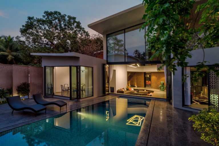 Design Detail - A Sunken Living Room Sits By The Pool At This New House