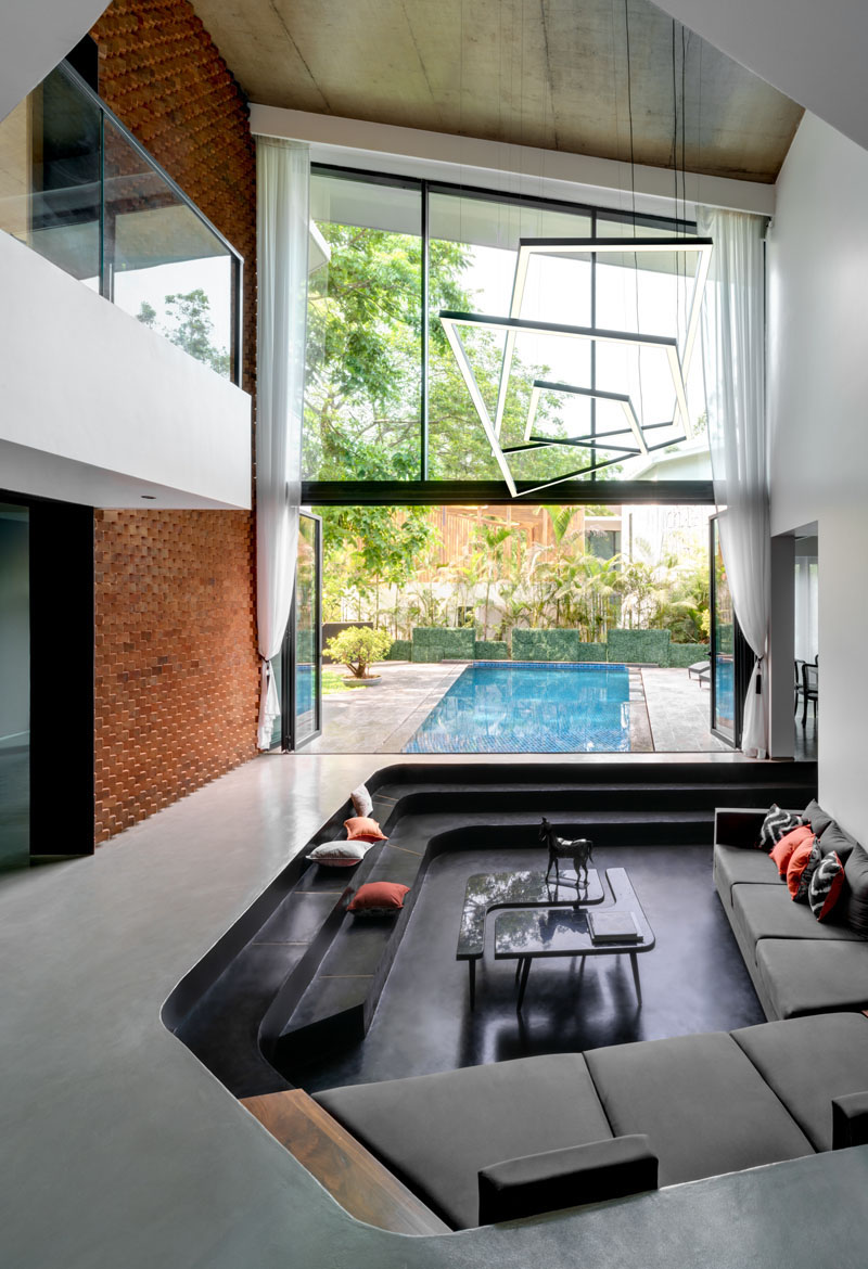 Design Detail - A Sunken Living Room Sits By The Pool At This New House