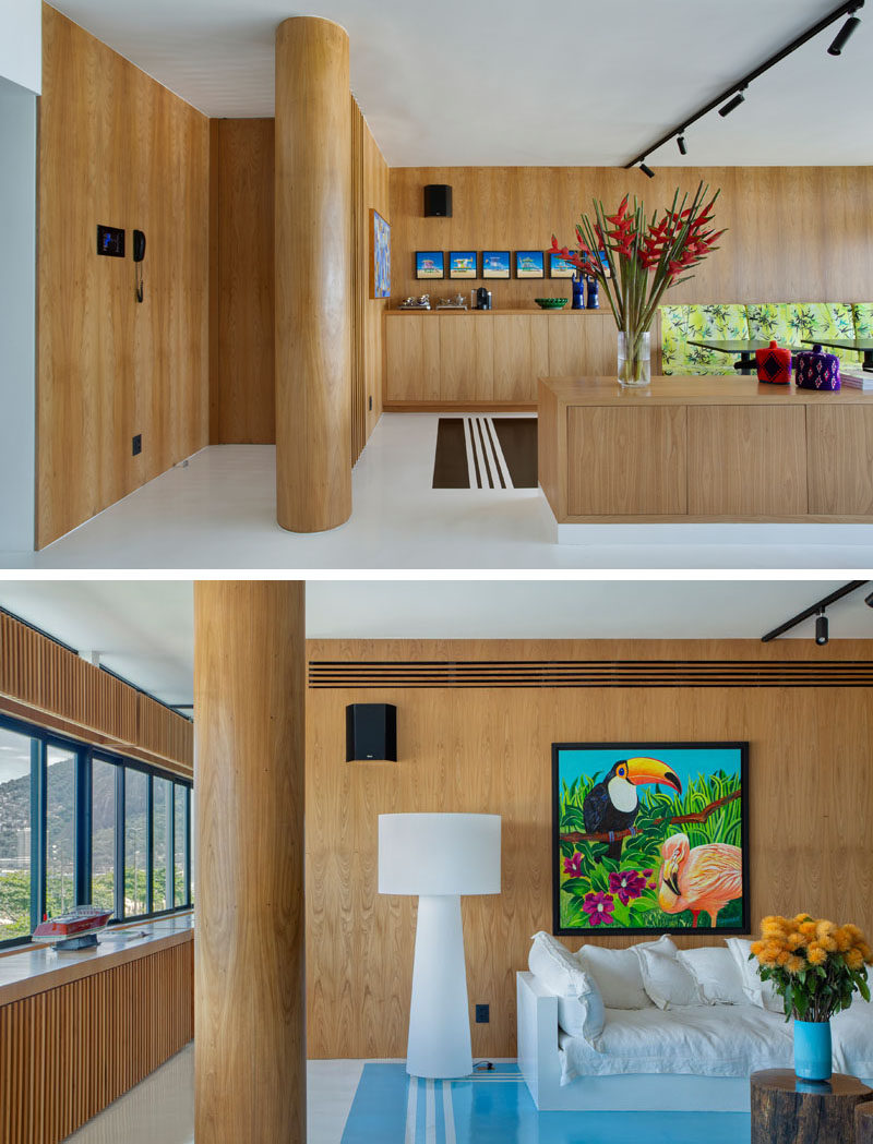 The concrete columns in this modern apartment have been wrapped in wood to match the surrounding wood detailing in the interior, creating a cohesive appearance. #Columns #WoodColumns #InteriorDesign #Interiors