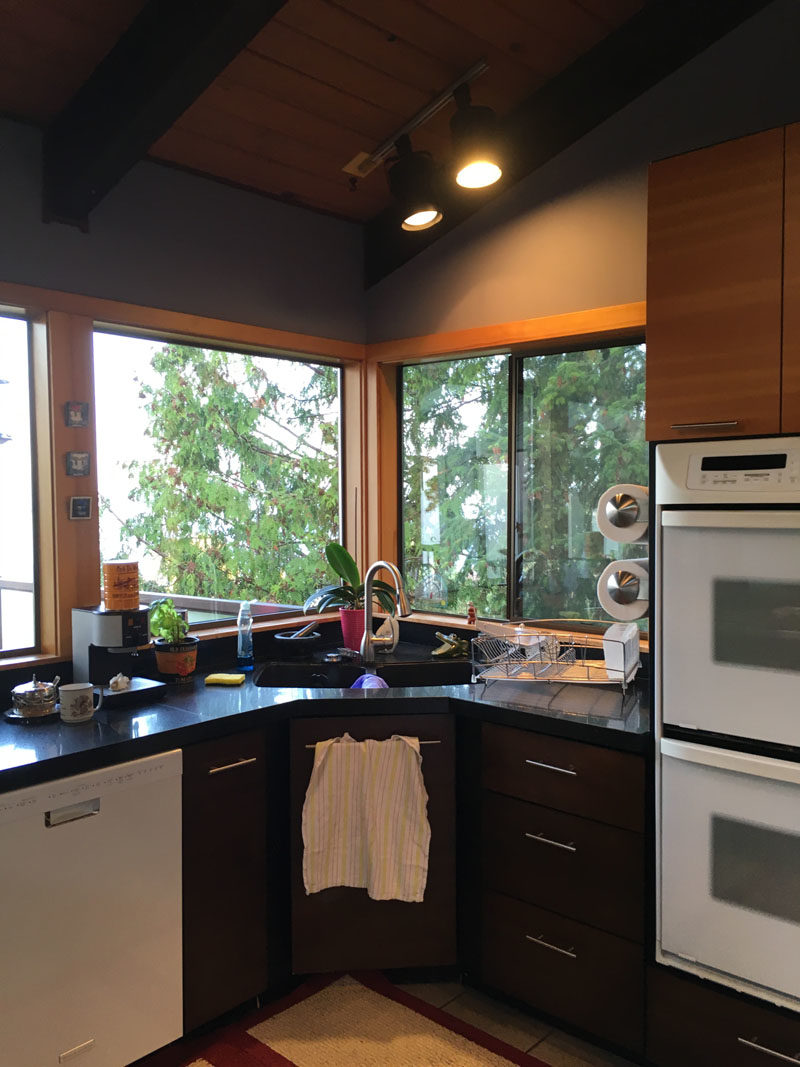 Kitchen Renovation (before pic) - Interiors by Popov were asked by their clients to transform a dark and gloomy kitchen that lacked counter space, and replace it with one that would be bright and complement the rest of the house. #KitchenRenovation #KitchenDesign