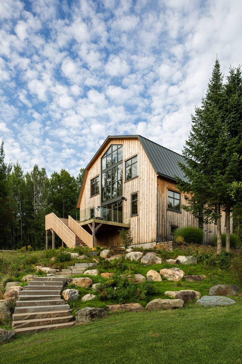 Architecture studio La Firme, have completed the modern restoration of a 100 year old barn in Quebec, Canada. #Barn #ModernBarn #Architecture #Landscaping #LandscapeDesign