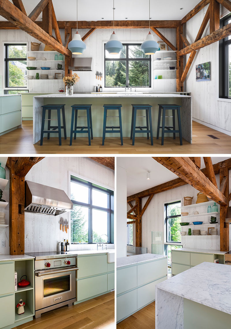 Kitchen Ideas - In this kitchen, whitewashed walls complement the thin floating shelves and light green cabinets. #KitchenDesign #KitchenIdeas #ModernKitchen #BarnKitchen