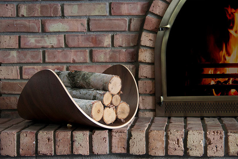 Firewood Storage Ideas - The Mission Firewood Holder was inspired by the design of the aspen leaf, and has a shape that cradles the firewood. #FirewoodStorage #FirewoodHolder #Design #ModernDecor #Fireplace #ModernWoodHolder