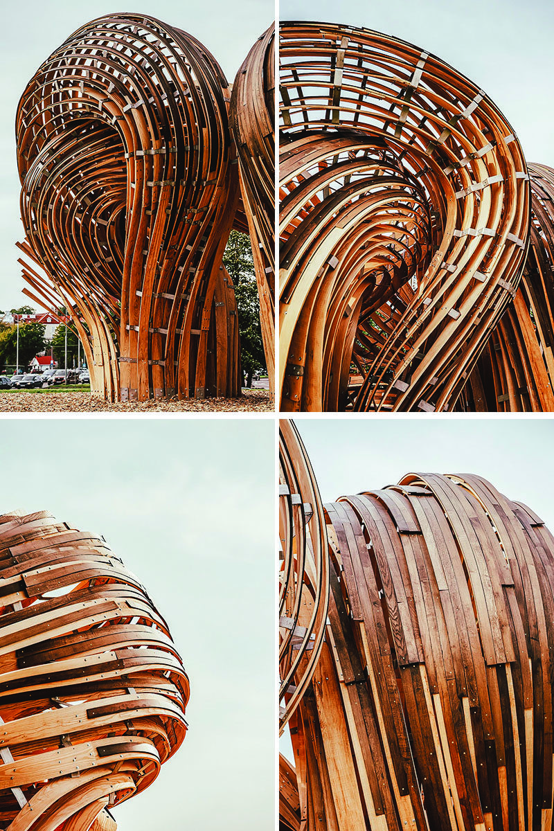 Sculpture Ideas - Using analogue tools augmented with the precision of mixed reality environments, the designers of this modern sculpture were able to create the curved shape that makes the wood appear as if it's flowing. #Sculpture #PublicArt