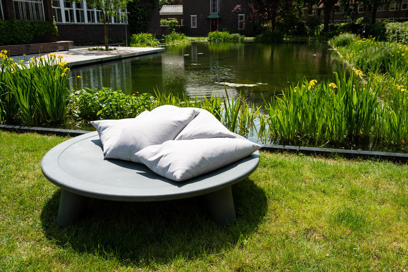Outdoor Furniture Ideas - Weltevree has collaborated with designer Joep van Lieshout, to create 'The Flying Dishman', an outdoor daybed that's partly made from recycled waste containers. #Daybed #OutdoorFurniture #OutdoorDaybed #OutdoorLounge