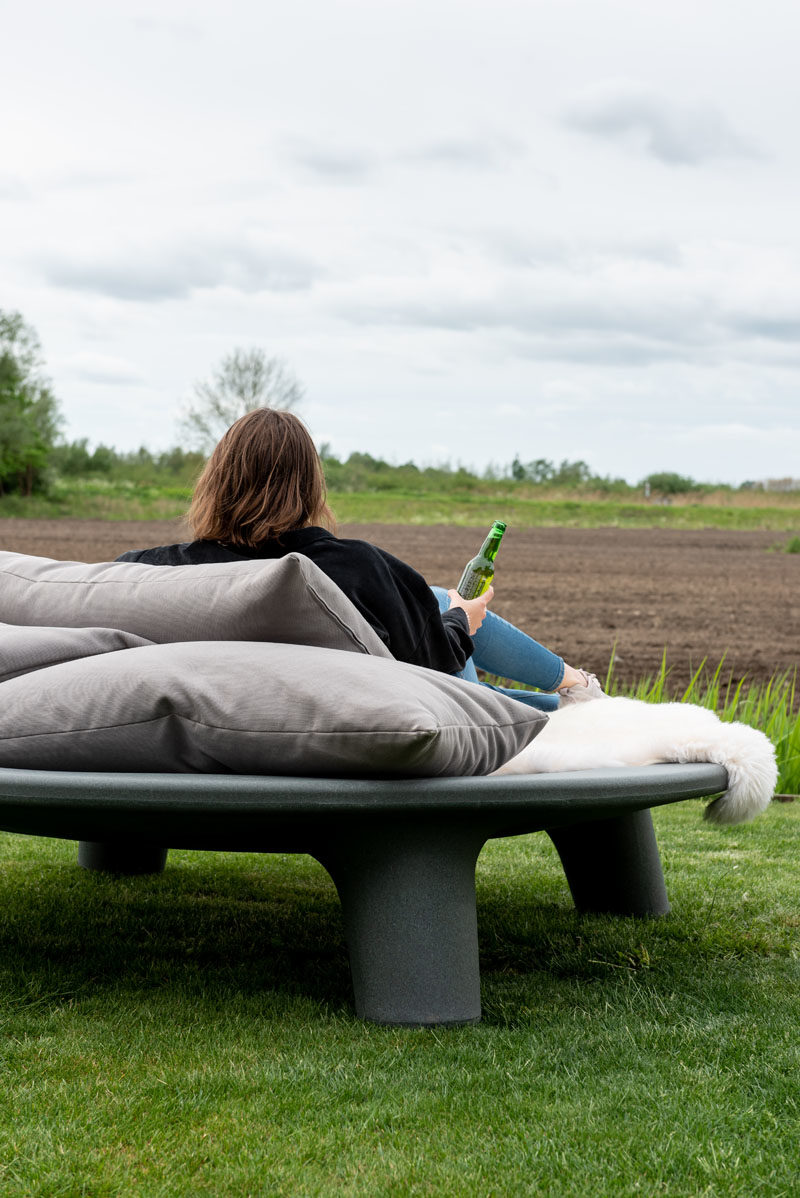 Outdoor Furniture Ideas - Weltevree has collaborated with designer Joep van Lieshout, to create 'The Flying Dishman', an outdoor daybed that's partly made from recycled waste containers. #Daybed #OutdoorFurniture #OutdoorDaybed #OutdoorLounge