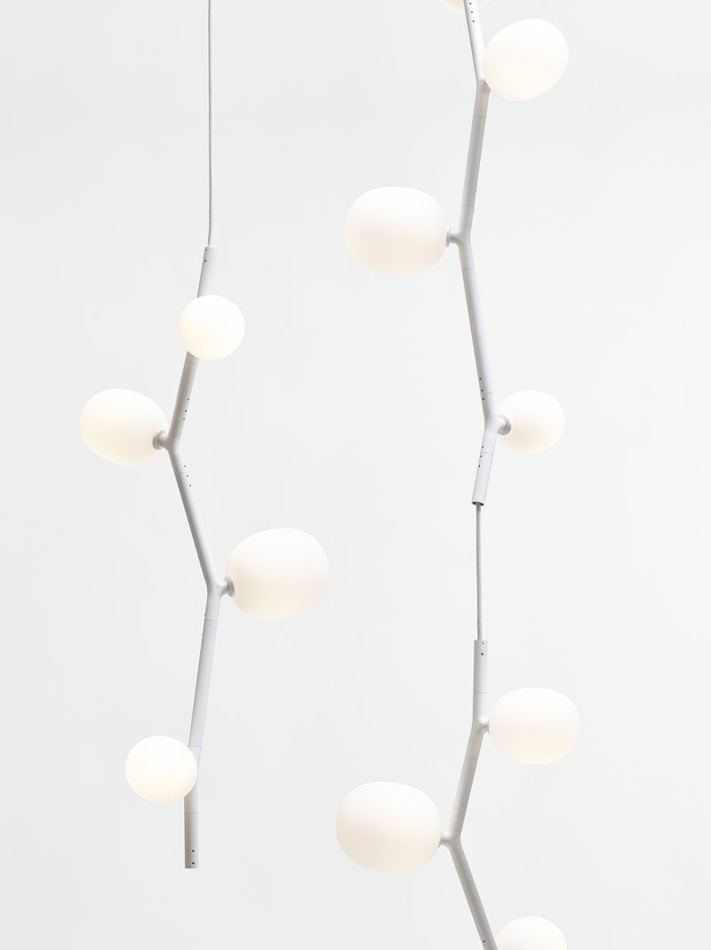 Product and furniture designer Lucie Koldova, has created the IVY collection, that includes a variety of modern lights that draw inspiration from the plant with the same name. #Lighting #LightingDesign #PendantLight #LucieKoldova #Design #Decor