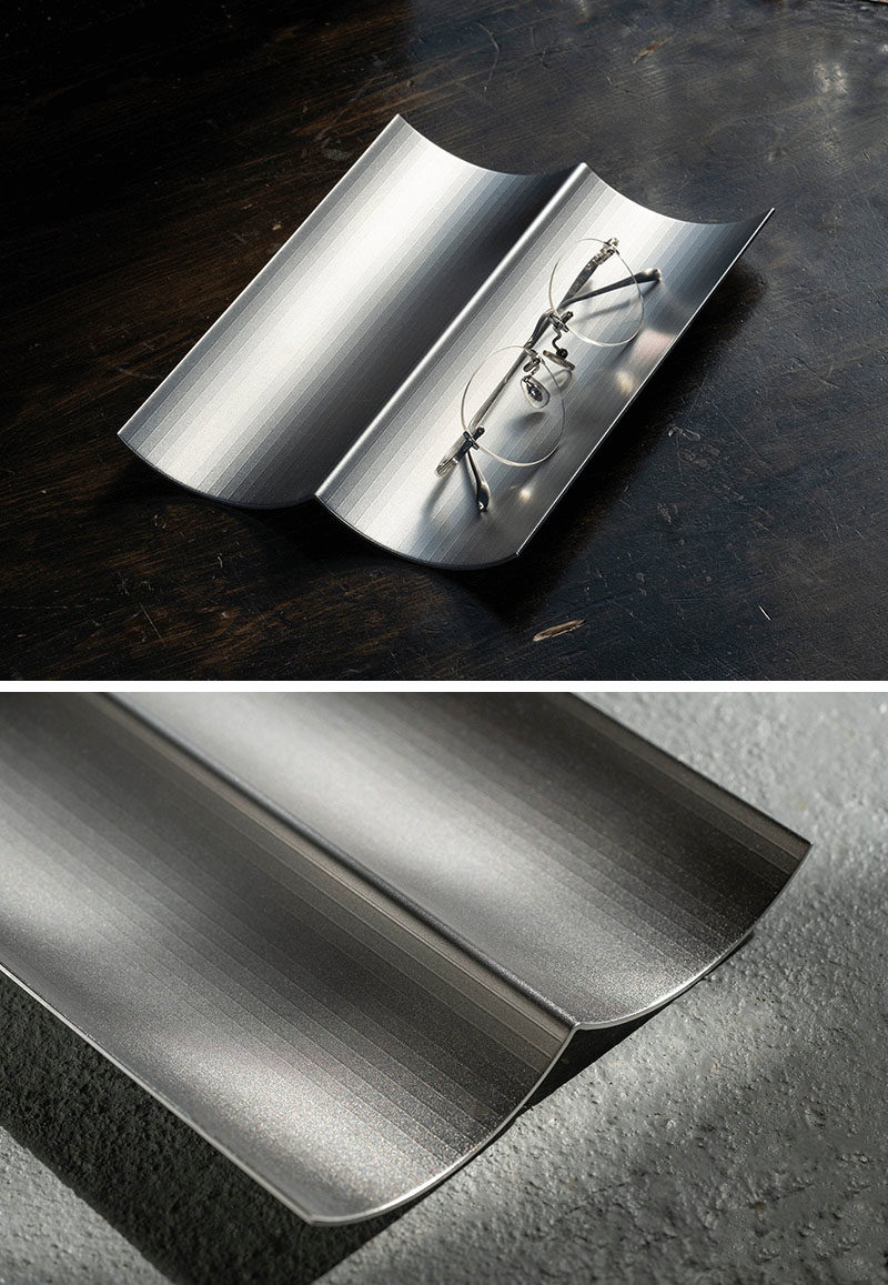 Gift Ideas - This modern tray is made from a single piece stainless steel, and has a wavy shape, creating a catch-all for pens, paperclips, and business cards. #ModernTray #HomeOfficeDecor #HomeOfficeAccessories #GiftIdeas #Design