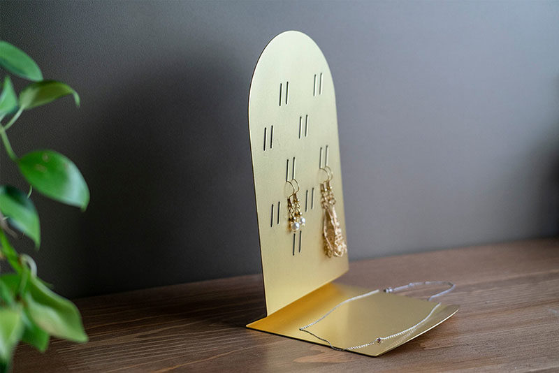 Gift Ideas - Vancouver based design studio Isle Collection, has created a modern jewelry holder that provides a place to hang earrings and hold necklaces. #GiftIdeas #JewelryHolder #JewelleryHolder #Design #Decor