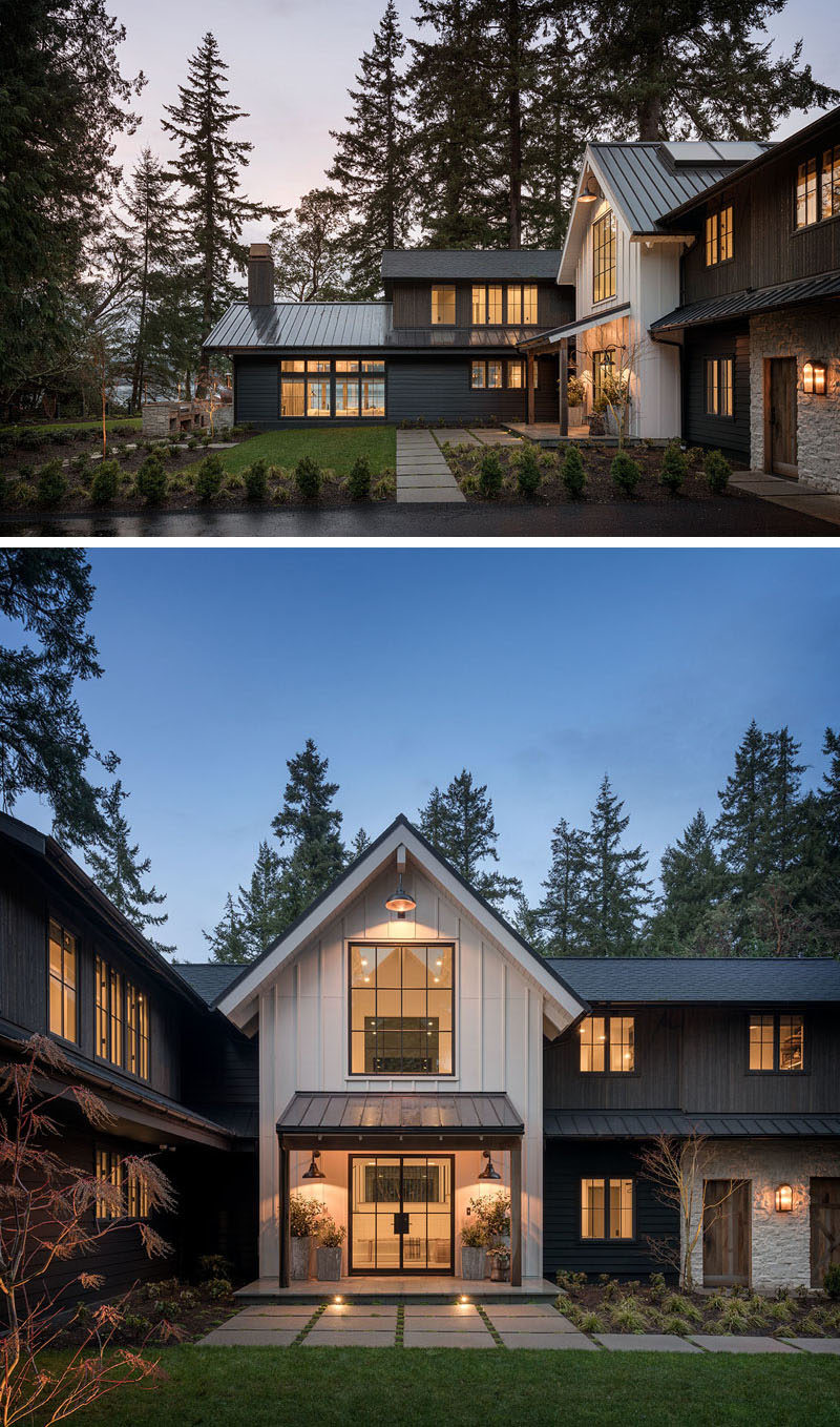 The exterior of this modern farmhouse features tight knot cedar tongue and groove siding finished in a black stain, and an accent of white board and batten siding. #ModernFarmhouse #FarmhouseModern #Siding