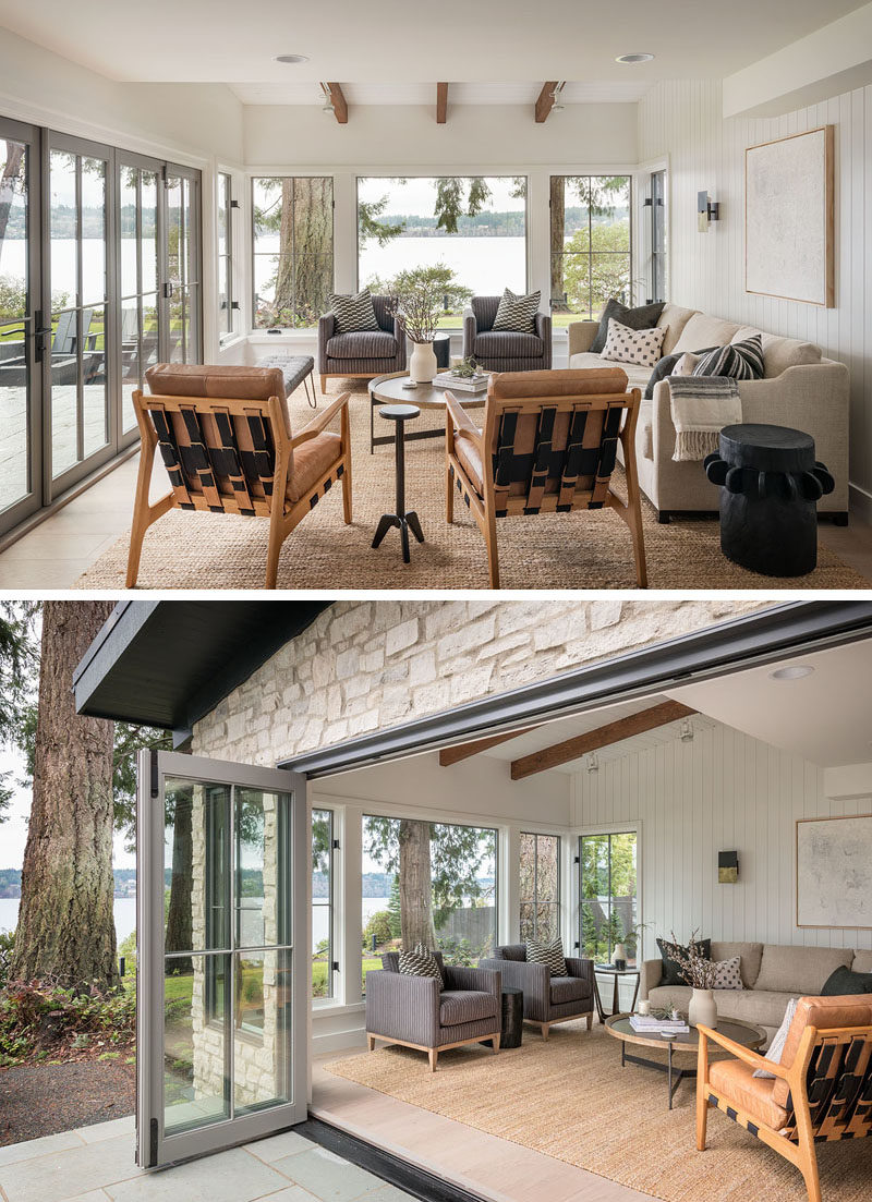 Living Room Ideas - Folding doors open this contemporary living room to the patio outside, while large windows provide uninterrupted views of the water. #LivingRoom #Windows #LivingRoomIdeas