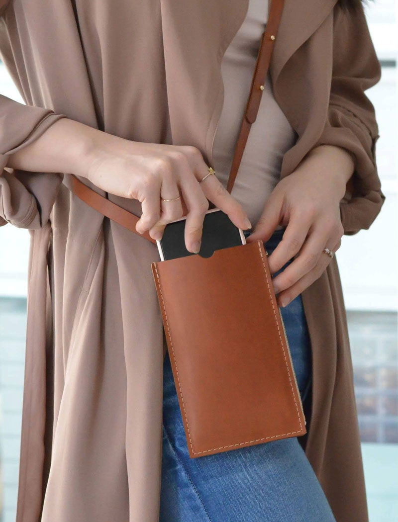 Style Ideas - This modern leather cellphone sling allows you to keep your phone close while staying completely hands free. In addition, it has a double pouch with a zipper closure, and an additional card sleeve. #Style #CellphoneSling #PhonSling #LeatherBag #MinimalistBag #ModernStyle #ModernBag #SmallHandbag