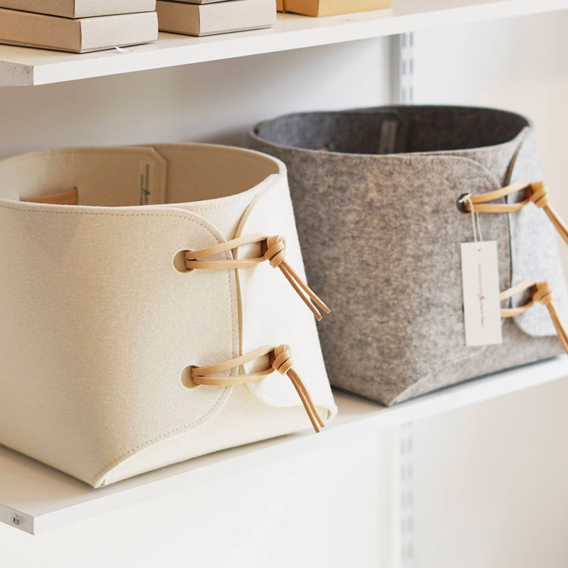 Storage Ideas - SKANDINAVIOUS has designed a collection of modern storage baskets, that are made from felt and leather, are collapsible, come in a range of sizes, and can be used as toy storage, bathroom storage, as a magazine holder, pantry bins, and a variety of other uses. #StorageIdeas #StorageBins #StorageBaskets #FeltBaskets #ModernDecor #ModernBaskets