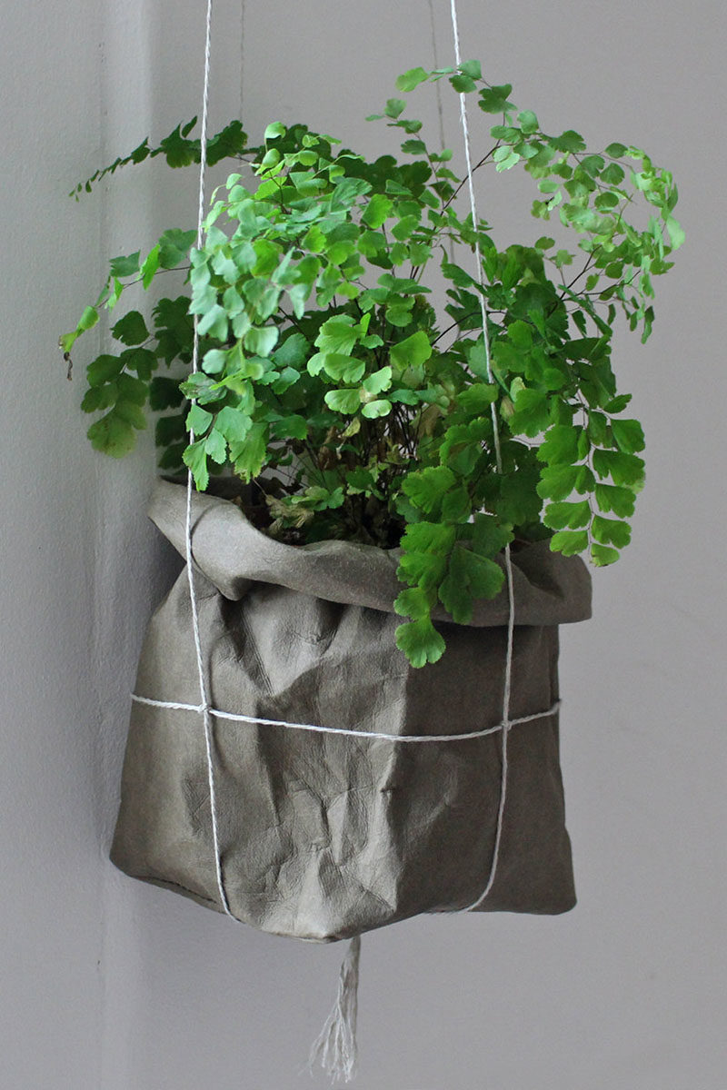 Decor Ideas - Mairita Jonikane of the WarmGreyCompany has designed a collection of modern hanging planters, that look like paper bags and are made from a natural cellulose fibre. #HangingPlanters #Planters #HomeDecor #ModernDecor #Decor Ideas #Plants
