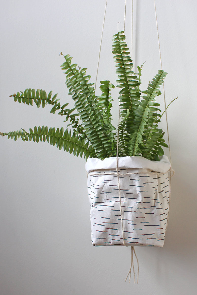 Decor Ideas - Mairita Jonikane of the WarmGreyCompany has designed a collection of modern hanging planters, that look like paper bags and are made from a natural cellulose fibre. #HangingPlanters #Planters #HomeDecor #ModernDecor #Decor Ideas #Plants