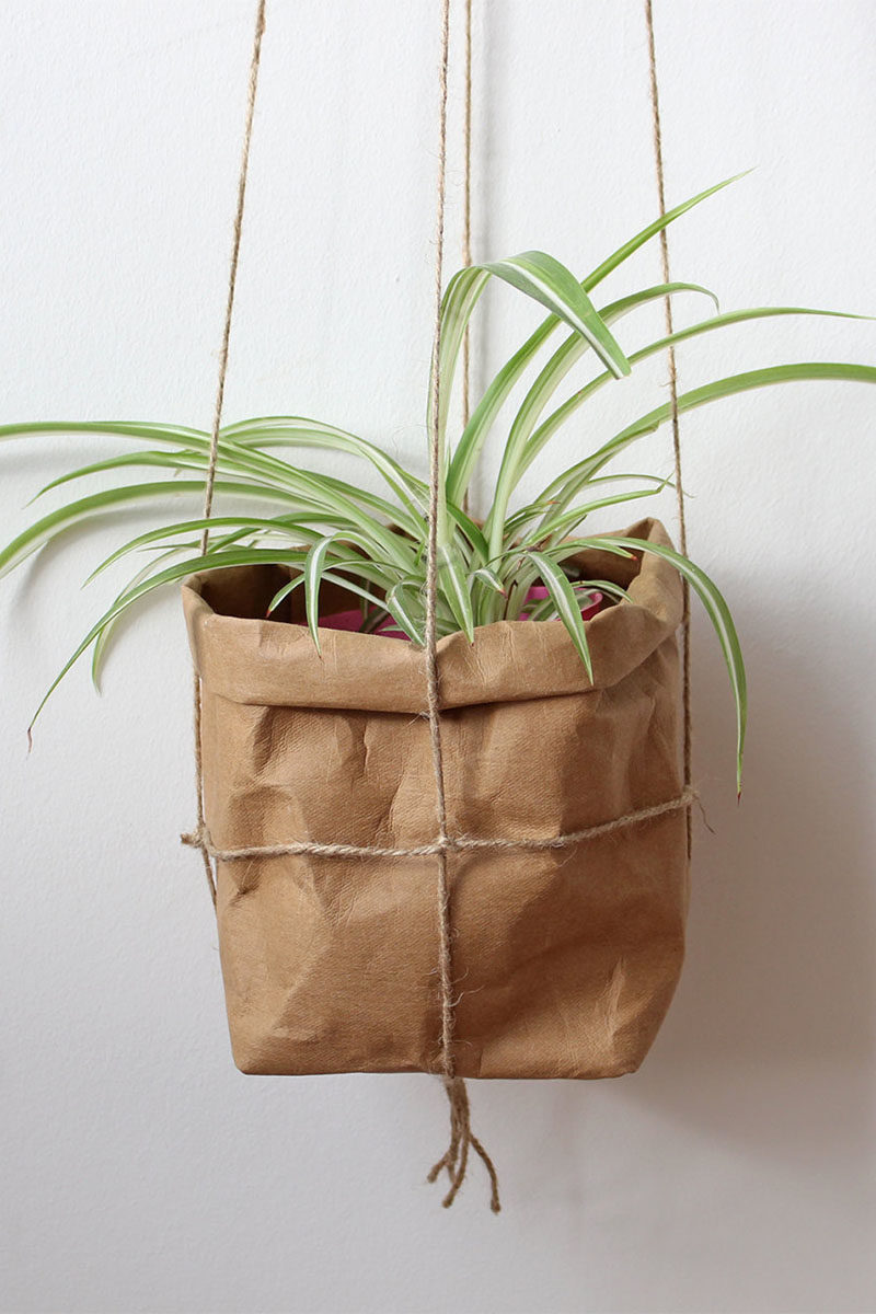 Decor Ideas - Mairita Jonikane of the WarmGreyCompany has designed a collection of modern hanging planters, that look like paper bags and are made from a natural cellulose fibre. #HangingPlanters #Planters #HomeDecor #ModernDecor #Decor Ideas #Plants