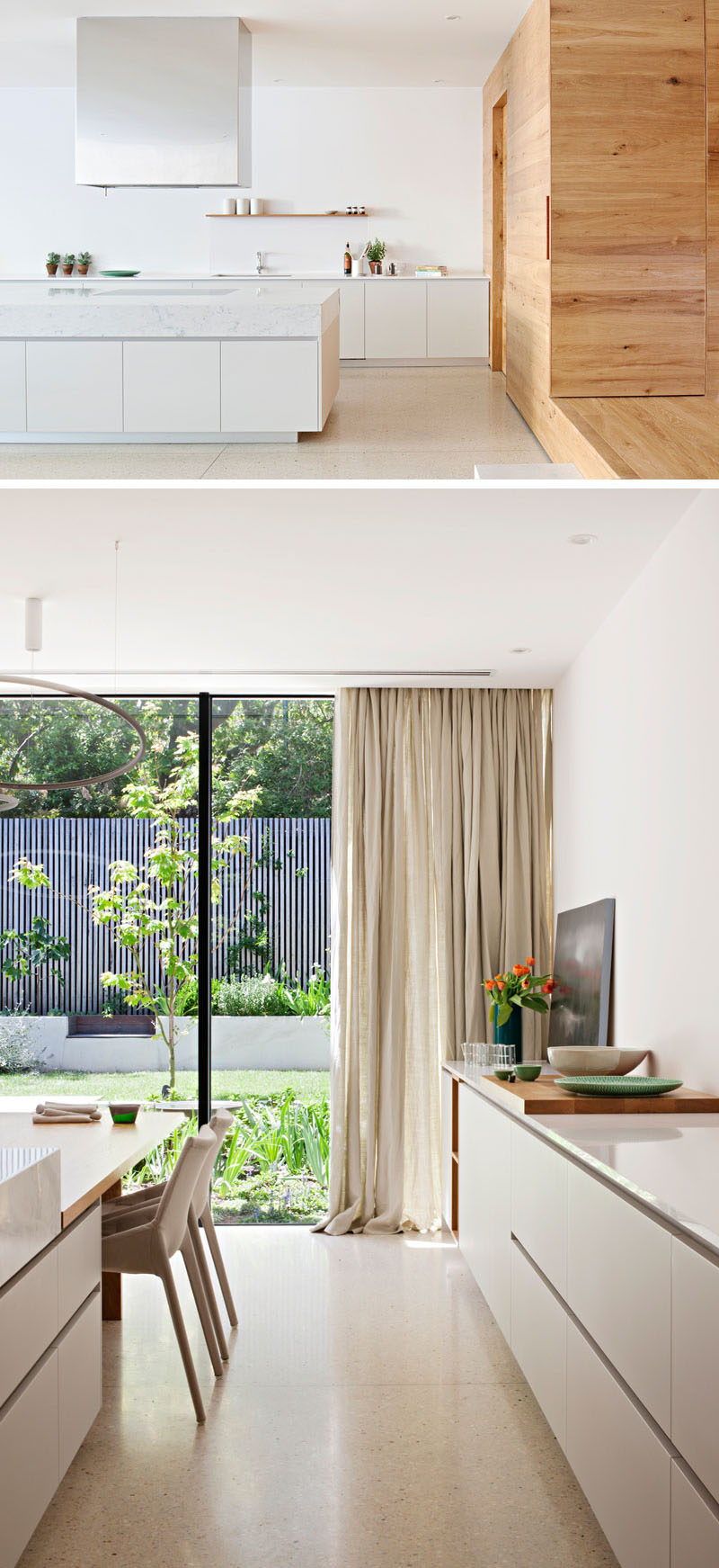 Kitchen Ideas - This kitchen has minimalist white cabinets that blend into the wall, and run the length of the room. #KitchenDesign #KitchenIdeas #WhiteKitchen #ModernKitchen