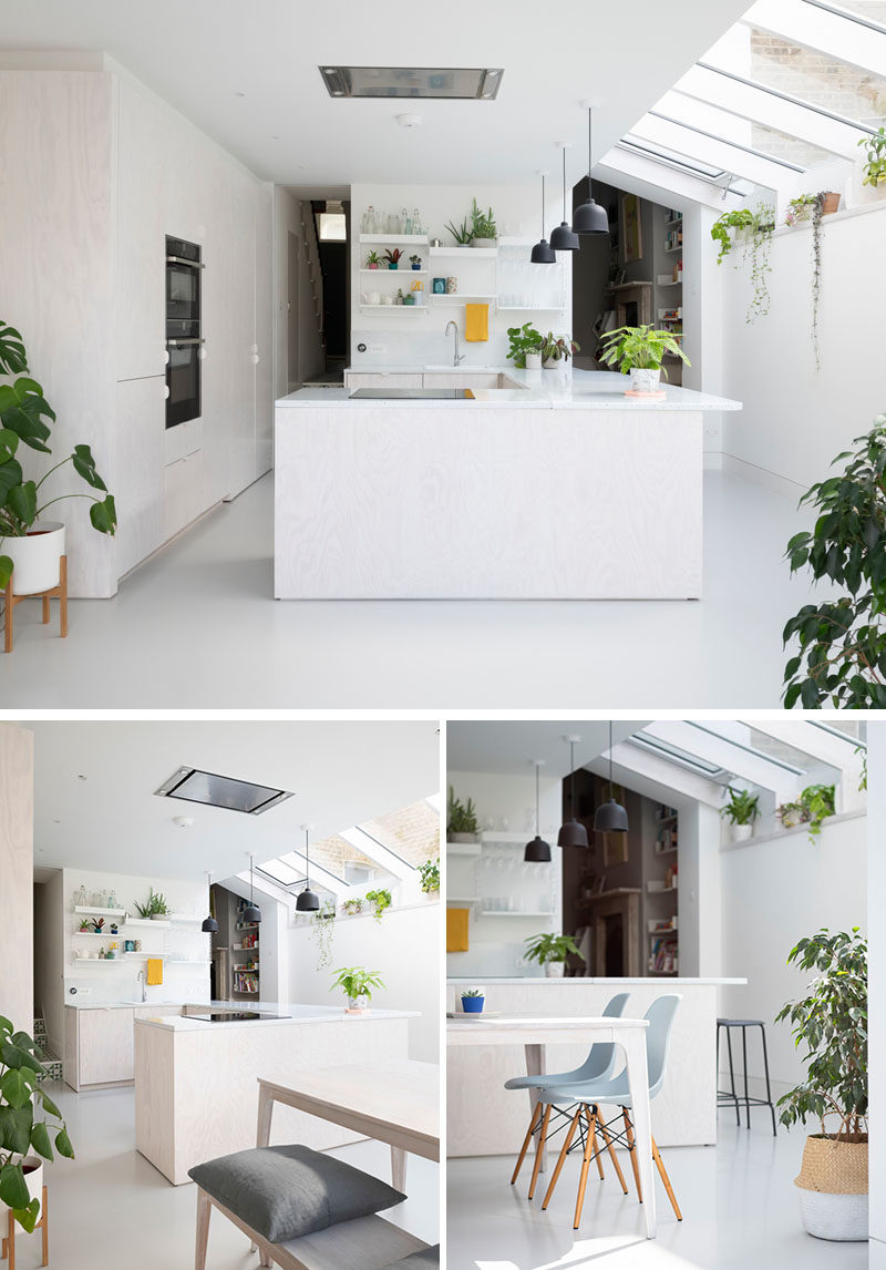 Kitchen Ideas - This modern kitchen has whitewashed Douglas Fir cabinets, an enamel splatterware worktop, and a plant shelf that runs the length of this new extension. #ModernKitchen #WhitewashedWood #PlantShelf